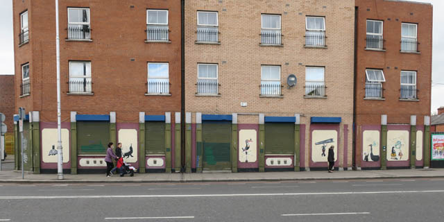 Реклама Гинесса на доме в Дублине